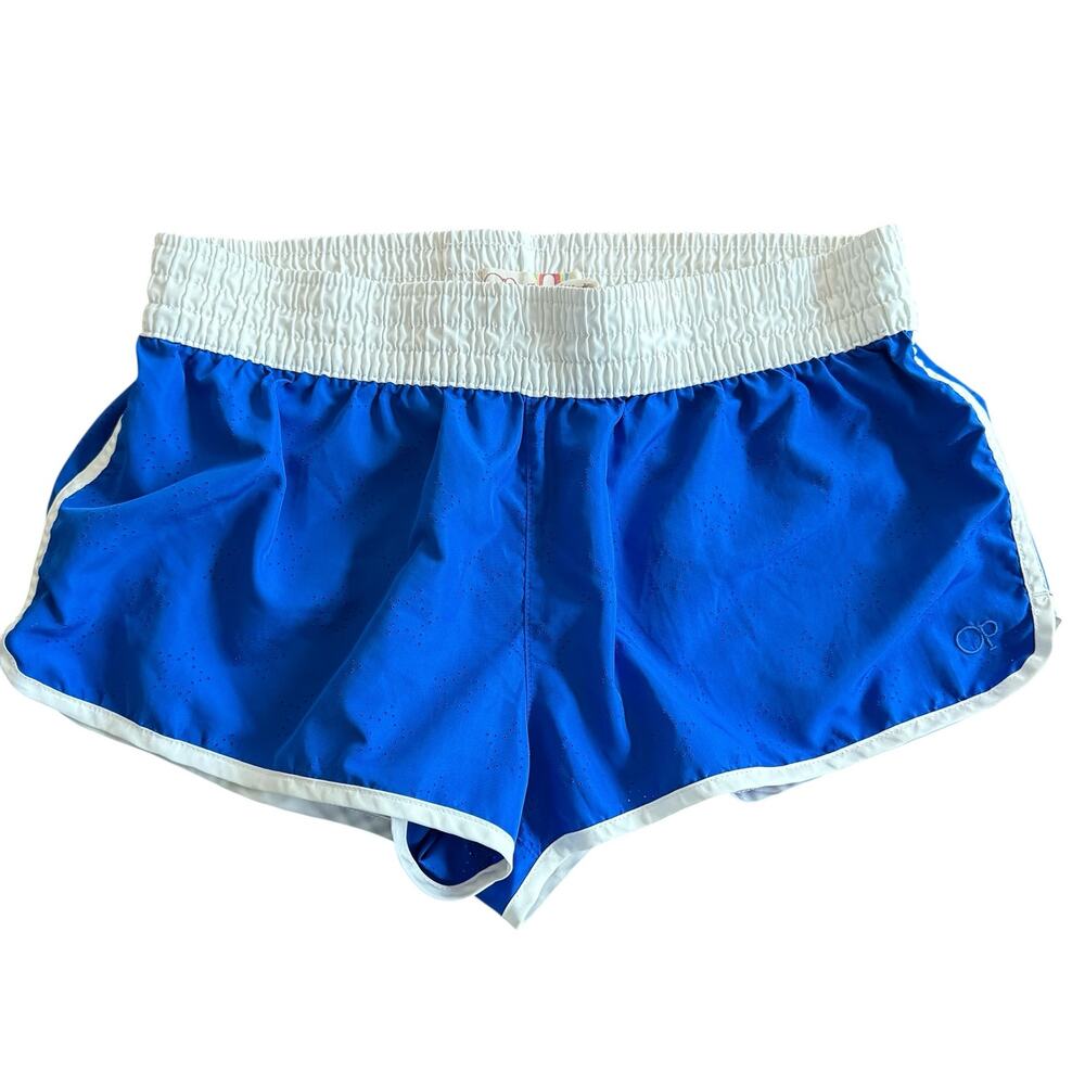 OP Girl’s cobalt blue athletic shorts, star die-cut pattern and white trim, M